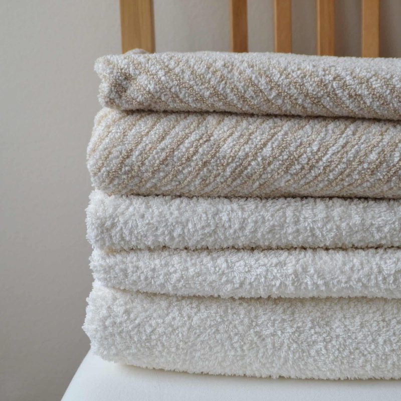 towels-on-wooden-chair-2023-11-27-05-12-39-utc
